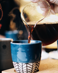 RIP Coffee being poured into a mug